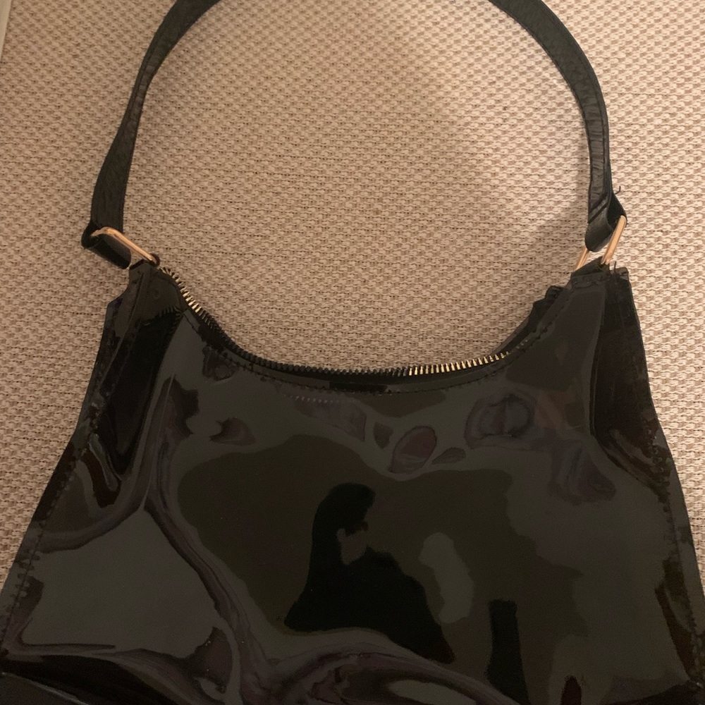 Black SHEIN clear shoulder bag.